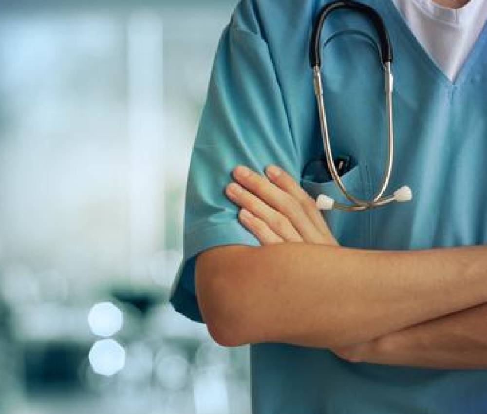 Doctor speaking with a patient in a bright clinic